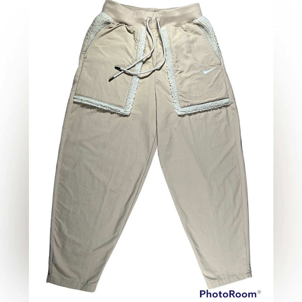 NEW! NIKE loose fit high rise woven pants in tan. Small